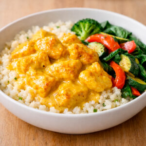 Pollo en salsa curry y coco + arroz de coliflor