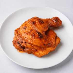 Muslo de pollo achotado